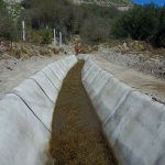 Mantas geosintéticas con compuesto cementicio: Estandarización de metodologías de prueba para geosintéticos rellenos de hormigón